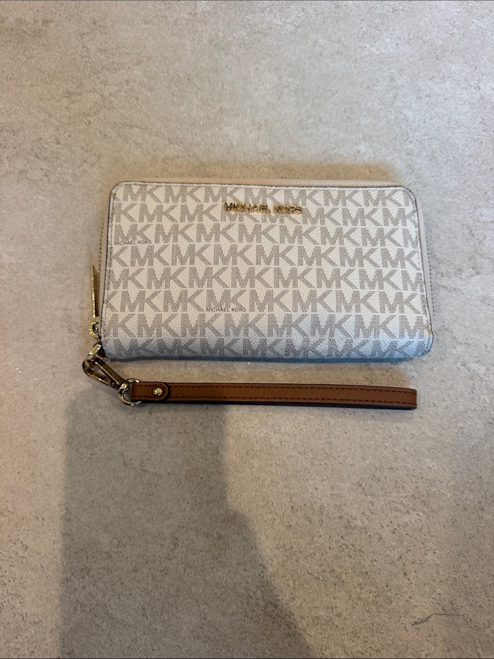 Michael Kors Vanilla Signature Zip-Around Wristlet with Brown Strap